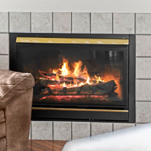 Warm fireplace creating a cozy atmosphere during cooler evenings indoors