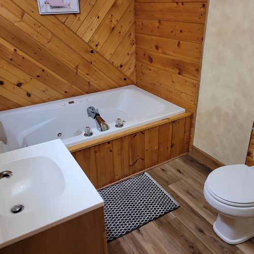 Bathroom #2:  the main floor's full bathroom with a jetted bathtub