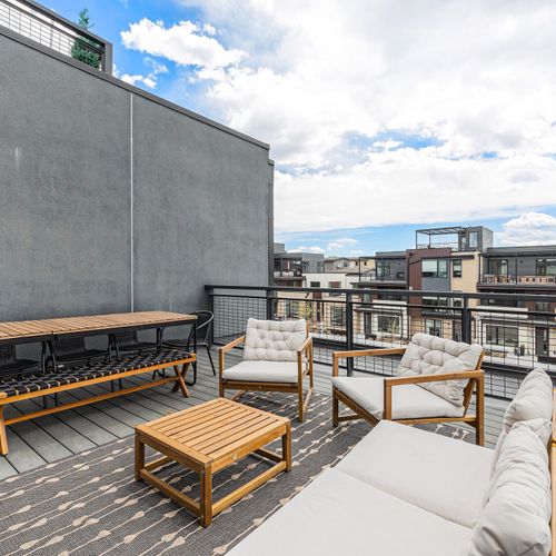 Sink into cozy terrace sofas with room to lounge and enjoy the sunlight.