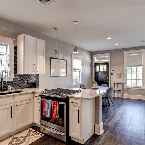 Open kitchen flowing into the dining space — everything you need right at your fingertips.