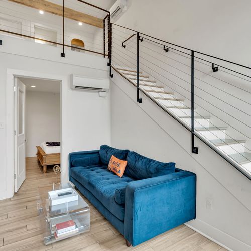 Clean lines & open space flow seamlessly between the living area & bath.