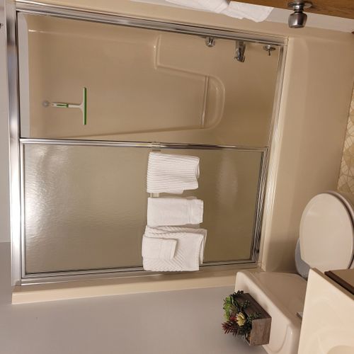 Bathroom #2:  common full bathroom with a combination tub and shower.