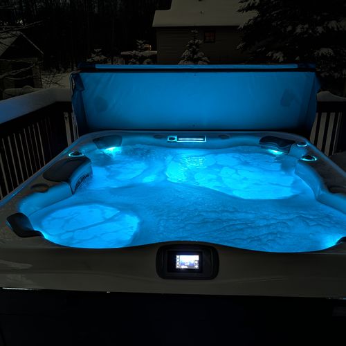OVERVIEW:  Guests can select different colors for the hot tub to light up in at night.
