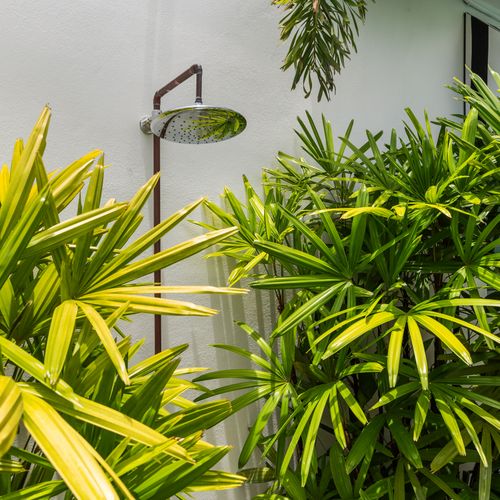 Refreshing outdoor shower, perfect for rinsing off after a day in the sun.