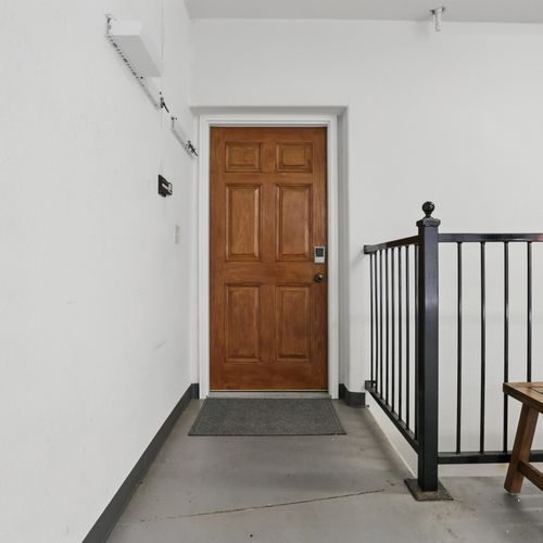 Your cozy retreat begins at this door.