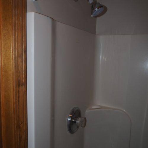 Bathroom #2 (main floor):  there is a convenient half-bath with a shower, toilet, and mirror at the back of the laundry room on the main floor.