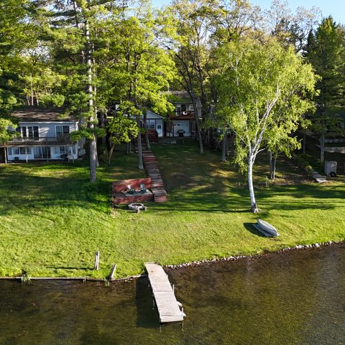 Overall:  aerial view of the dock and backyard