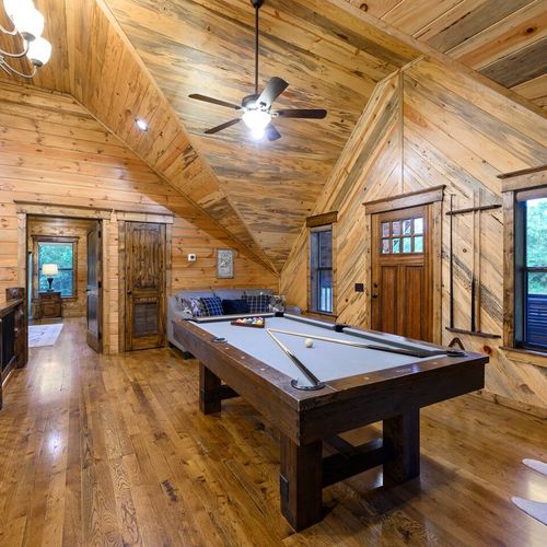 The loft has a pool table, Queen sofa sleeper and access to the balcony/