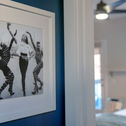 Stylish wall art and clean lines create a calm, well-designed living space