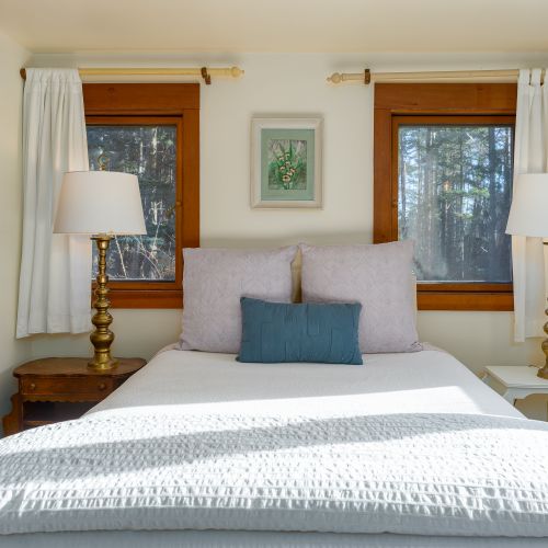 Guest bedroom #2 upstairs with a queen bed.