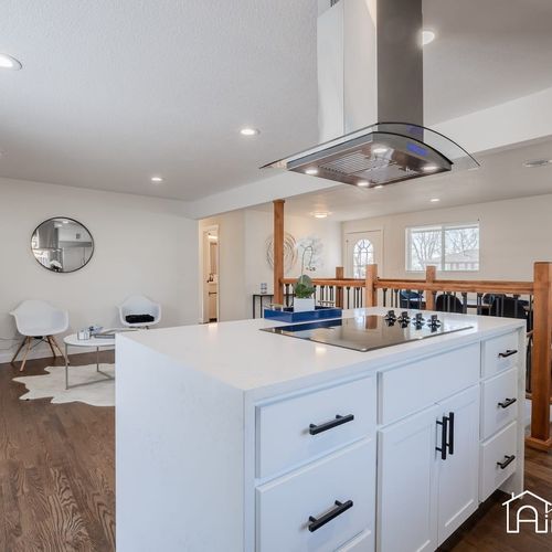 Brand new stainless steel appliances and brand new range are featured in the kitchen.