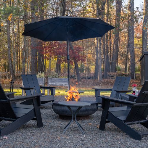 Gather by the fire pit at Oakwood Cabin!