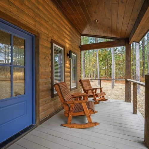 Rocking chairs welcoming you on the front porch.