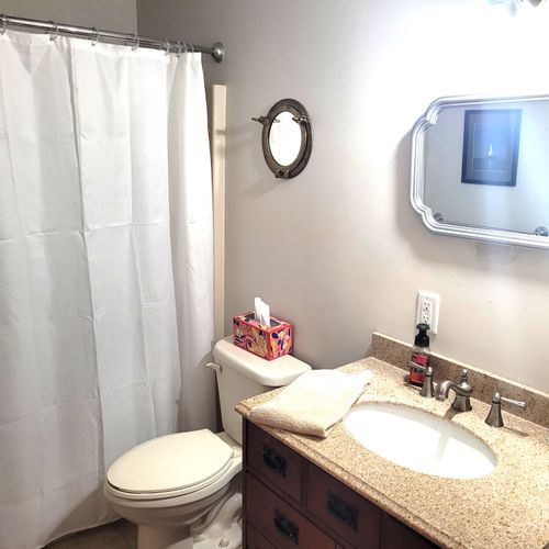 BATHROOM #1:  Private ensuite full bathroom for Bedroom #1, with a walk-in shower.