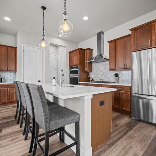 Open kitchen bar perfect for casual chats and quick bites.