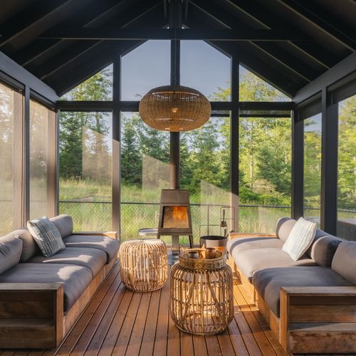 Pool House lounge area with wood burning stove.