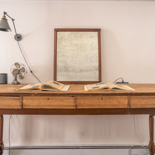 This antique desk is calling for you to embrace your inner scholar.