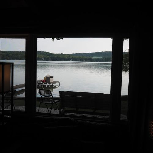 Living room:  the view of little glen lake at twilight from the living room window.