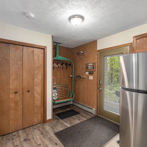 FRONT FOYER:  The entry of the home which leads into the kitchen area