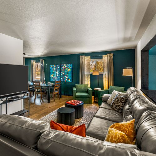 Kick back, catch a show, or just hang with your crew in the spacious and colorful living room.