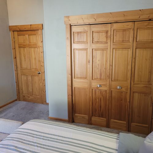 BEDROOM #2 (SECOND FLOOR):  Features a queen-size bed, closet, mirror, and private live-streaming television.