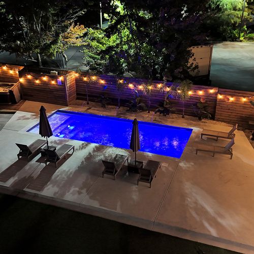 Take a dip under the stars in the glowing pool or relax in the hot tub for a perfect evening retreat.