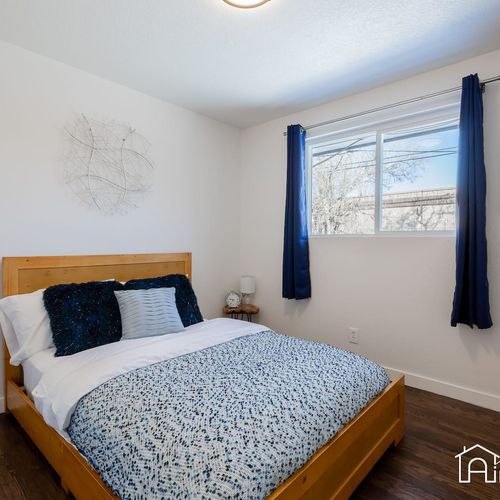 The third upstairs bathroom has a queen sized bed and a small closet for your belongings.