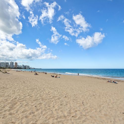 Unwind on sun-drenched sands. The ultimate beachfront relaxation spot.