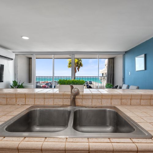 Modern, minimalist interior with bright colors reflecting the tropical surroundings.