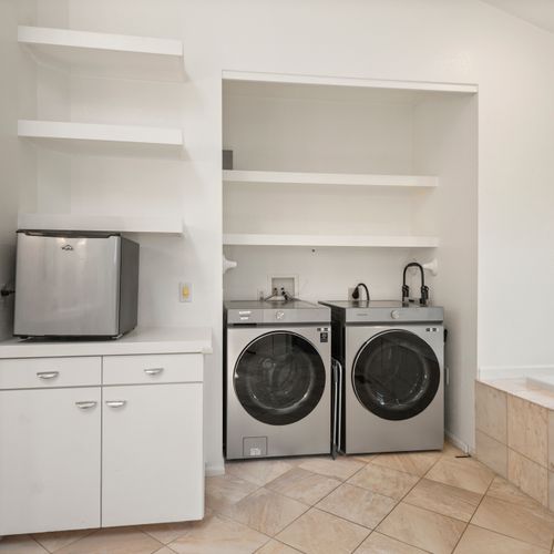 In-home washer and dryer for hassle-free stays.