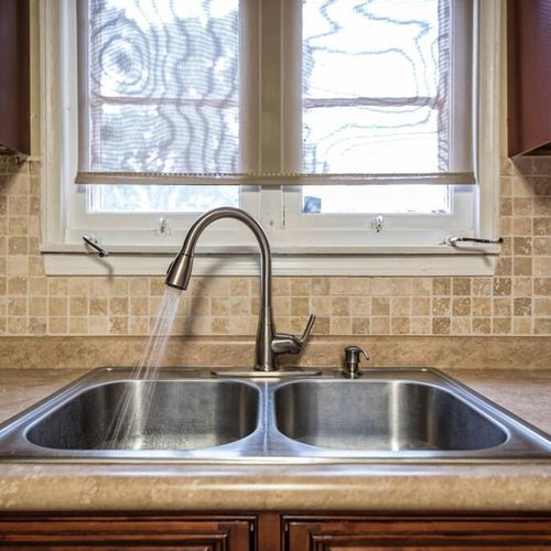 All the fully stocked kitchen conveniences of home