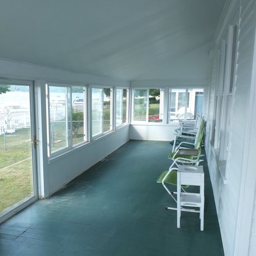 Overview:  the large, fun, and fully-enclosed front porch.
