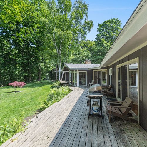 EXTERIOR:  The lovely deck that stretches across the entire back of the house