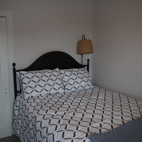 Bedroom #2:  all 3 bedrooms are upstairs. This bedroom features a queen-size bed, nightlamp, dresser, and a very large closet.