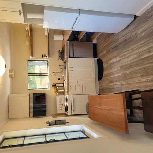 Kitchen:  the home has a very cute and newly updated kitchen with all appliances, including a dishwasher. Also includes a small breakfast nook with stools and a great view of crystal lake!