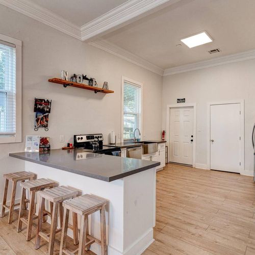 Casual kitchen bar seating — pull up a stool & enjoy a meal together.