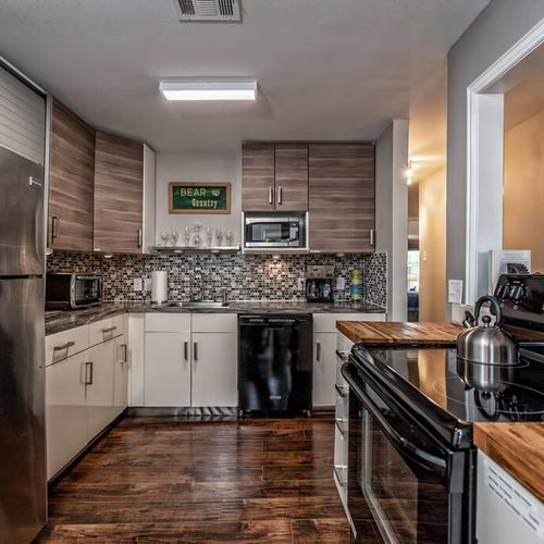 Fully stocked kitchen with a stove/oven, microwave, refrigerator, dishwasher, toaster oven, 12 cup coffee pot and coffee is provided.