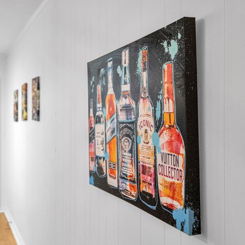 Fun and vibrant! This bold artwork brings a touch of local flavor to your stay, capturing the lively spirit of New Orleans in every detail.