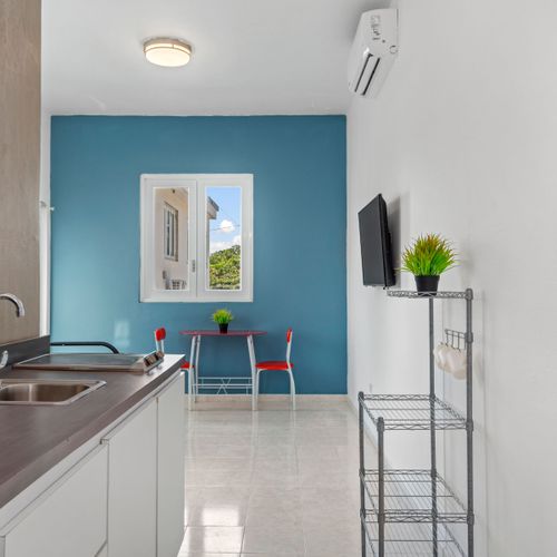 Bright and airy, the living space offers a comfortable retreat after a day of exploration. It's an ideal spot for morning coffee or simply enjoying the peaceful ambiance.