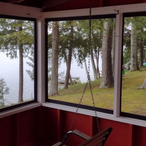 Front porch:  the cabin has a fun front porch that is screened-in, has a swing and picnic table, and has a great view of little platte lake.