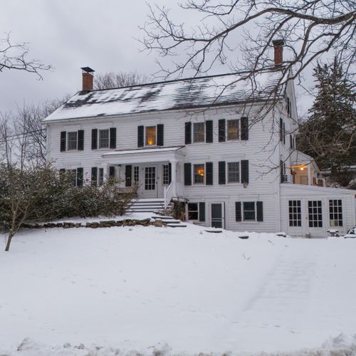 This stately home exudes classic, colonial charm.