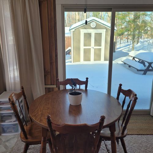 Dining area:  the new section of the cabin also includes a circular dining table with seating for 4 adults.