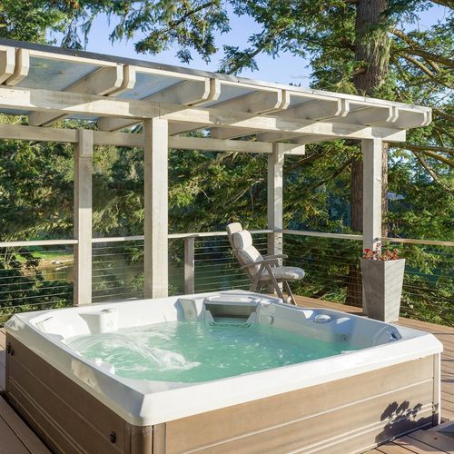 Four-person hot tub and lounge area