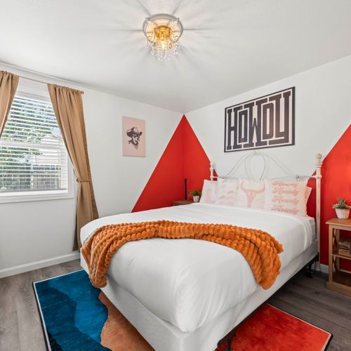 Rest easy in colorful, artful bedrooms with plush bedding and modern touches.