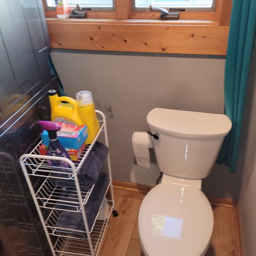 BATHROOM #2 (MAIN FLOOR):  This is a full common bathroom on the main floor with a walk-in shower.  Also has a stacked washer and dryer in it.