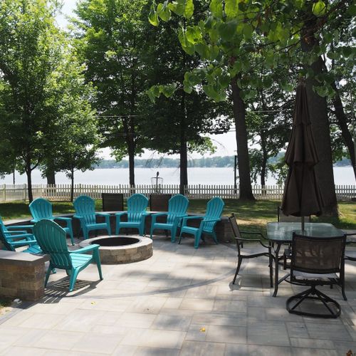 Overview:  the wonderful new outdoor bonfire ring and outdoor dining table, both with great views of the lake!
