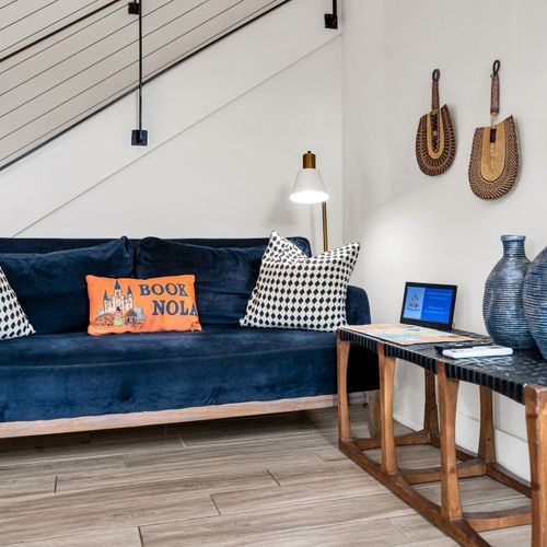 Chic and cozy lounge space with local flair—perfect for kicking back and planning your New Orleans adventures.