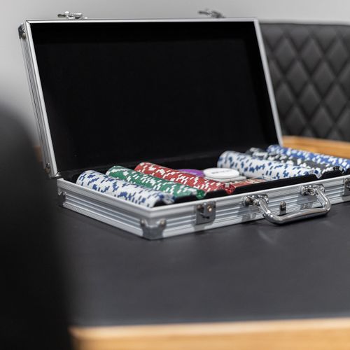 Raise the stakes and host a poker night with friends and family around our poker table complete with a professional chip set in the game area.