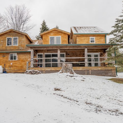 a beautiful front view of our log cabin