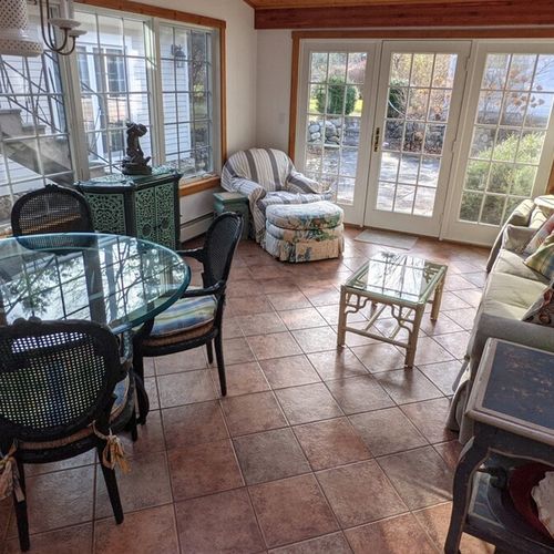 Sun room:  just out from the kitchen towards the back of the house there is a lovely sun room for chatting and relaxing while enjoying the sunshine!